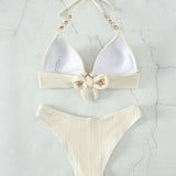 Costum de baie monocolor cu sutien push-up legat cu lanț