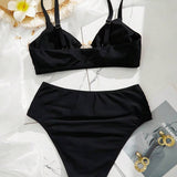 Costum de baie negru cu decorare din metal în formă de stea de mare