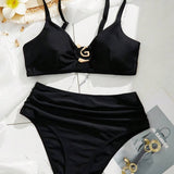 Costum de baie negru cu decorare din metal în formă de stea de mare
