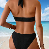 Costum de baie negru cu decorare în formă de scoică