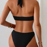 Costum de baie negru cu decorare în formă de scoică