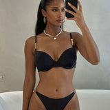 Set bikini din material uniform cu detalii la bretele